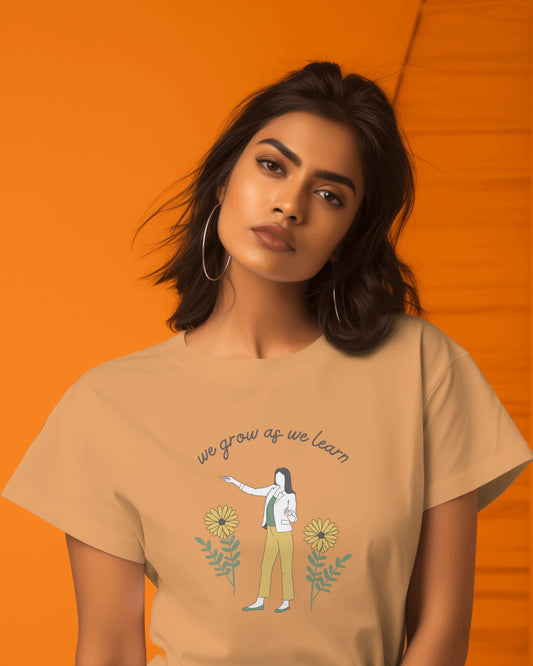 We Grow As We Learn Women Tshirt